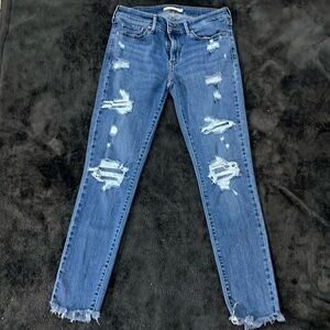 Levi’s 711 Skinny destroyed medium wash jeans 28
